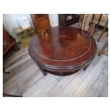Round coffee table, 40 inches wide.