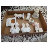7 precious moment figures.