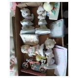 7 precious moment figures.