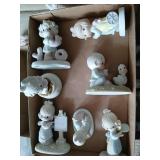 7 precious moment figures.