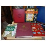 5  stamp albums with some stamps.