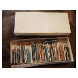 14 miniature knives in box, 2 inches open.