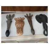 4 animal heads while hanging 15' tall giraffe