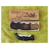 2 knives one in box biggest is 4 1/2 inch.