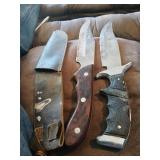 2 sheath knives, 11 inches.