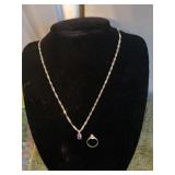 5 grams size 2 ring and a Sterling necklace, 20'