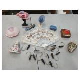 A lot of miniature hats purses shoes, fan