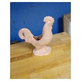 Pink pottery rooster 9.5 inches tall.