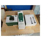 Dept 56 lights and trees 3 pieces in the box.