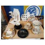 Lot cups, saucers, basket and more.