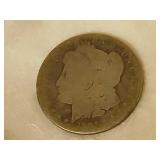 1884 Morgan silver dollar.