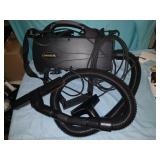 Oreck handheld, canister vacuum cleaner works.