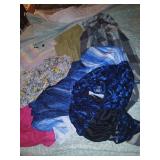 Box of women's clothes, jackets and more.
