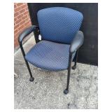 Blue Rolling  chair.