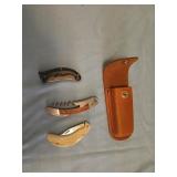 3 Pocket knives and  empty scharade sheath