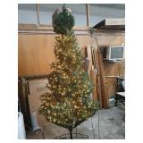 9 foot lighted Christmas tree in 2 zober bags.