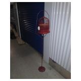 Vintage metal red bird cage and stand