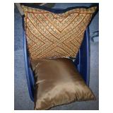 Pillows, shams, dust ruffle bin full.