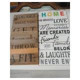 2 wooden signs, 26 and 24 inches tall.