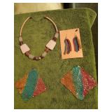 Necklace and 2 pair of dangling earrings.