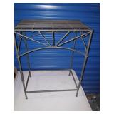 Metal stand 16 inches wide, 21 tall.