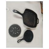 3 cast iron pieces frying pan and trivet.