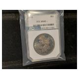 1879 PC IMS 65+ excellent toning Morgan dollar.