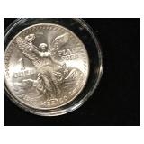 1983 Mexico one answer silver 999 libitard.