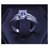 SOLITAIRE CUBIC ZIRCONIA IN NICELY ACCENTED MOUNT