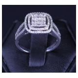 WHITE TOPAZ IN STERLING HALO MOUNTING STERLING