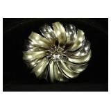 SWIRLING GOLD AND SILVERTONE BROOCH