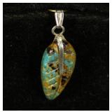 CARVED TURQUOISE PENDANT