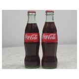 2pc Glass Coke Bottles 2009 & 2012