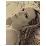 Kim Basinger facsimile signed photo. 8x10 inches