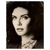Kelly McGillis facsimile signed photo. 3x4 inches