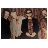 U2 facsimile signed photo. 6x9 inches