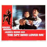 Roger Moore & Richard Kiel signed lobby card.