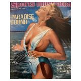Elle Macpherson signed Sports Illustrated...