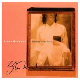Steve Winwood signed Refugees Of The Heart album