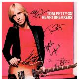 Tom Petty & The Heartbreakers signed  Damn The...