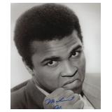 Muhammad Ali signed photo. GFA Authenticated