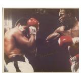 Muhammad Ali signed photo. GFA Authenticated