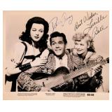 Lucille Ball and Desi Arnaz signed movie still...