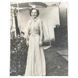 Young lady in garden vintage photo