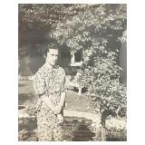 Woman in garden vintage photo