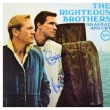 The Righteous Brothers signed Go Ahead And Cry...