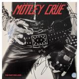 Motley Crue Too Fast For Love Signed Album. GFA...