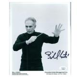 Composer Bill Conti signed photo. JSA...