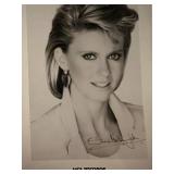 Olivia Newton John facsimile signed photo. 5x7...