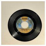 Mel and Tim Backfield in Motion 45 Album